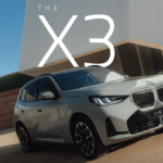 Three-quarter front view of the all-new fourth-generation BMW X3 (G45) in a modern architectural setting.