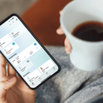 LG AI DD 2.0 washing machine and French-door refrigerator showcased in a luxury residential setting.