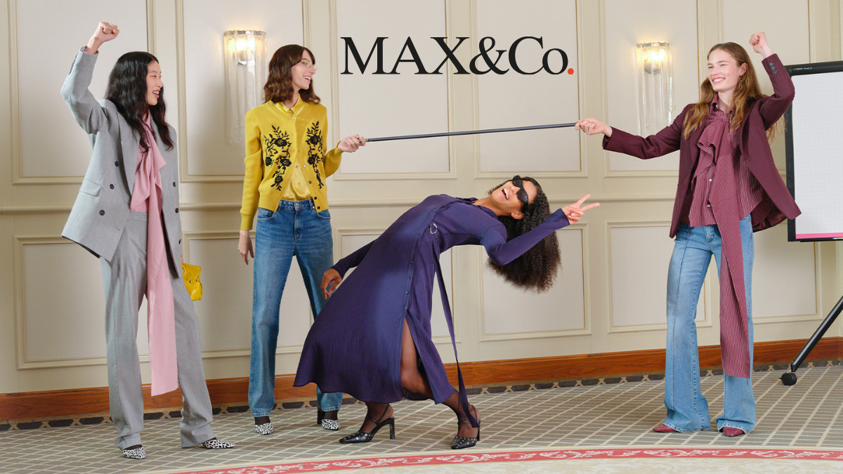 Reliance x MAX&Co. India: Italian Luxury Hits Mumbai 1 Four models in a high-status interior setting showcasing contemporary Italian fashion from MAX&Co., featuring a mix of tailoring, denim, and vibrant colors under the brand's logo.