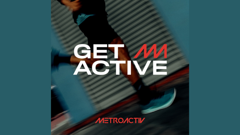 A motion-blurred action shot of a runner in teal METROACTIV athletic shoes and black performance gear, featuring the "GET ACTIVE" slogan and METROACTIV logo against an urban industrial background.