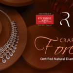 A high-end Reva Diamonds jewellery set featuring an intricate natural diamond and blue sapphire necklace with matching earrings, displayed on an earthy brown tiered pedestal against a dark background with "Crafted for Forever" branding.