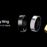 Three Samsung Galaxy Rings in Black, Silver, and Gold finishes displayed against a dark background with the text "Galaxy AI is here".
