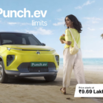 The new Tata Punch.ev facelift in Sunlit Yellow parked on a beach, highlighting its starting prices of ₹9.69 Lakh for the full car and ₹6.49 Lakh under the BaaS model.