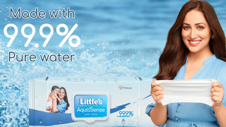 Brand ambassador Yami Gautam Dhar showcasing Little’s AquaSense baby wipes, highlighting the 99.9% pure water formulation against a refreshing water-splash background.