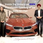 (L-R) Jaya Asokan, Fair Director of India Art Fair, and Hardeep Singh Brar, President and CEO of BMW Group India, standing before the BMW Concept Speedtop at the 2026 India Art Fair.