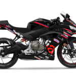 Side view of the 2026 Aprilia RS 457 GP Replica in MotoGP livery featuring the blacked-out aluminum frame and bi-directional quickshifter.