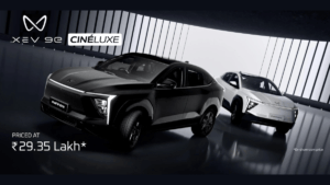 A high-contrast studio shot of the new Mahindra XEV 9e Cineluxe Edition in its exclusive Satin Black and Satin White matte...