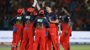 Royal Challengers Bengaluru (RCB) players including Rajat Patidar and teammates celebrating a wicket during their dominant...