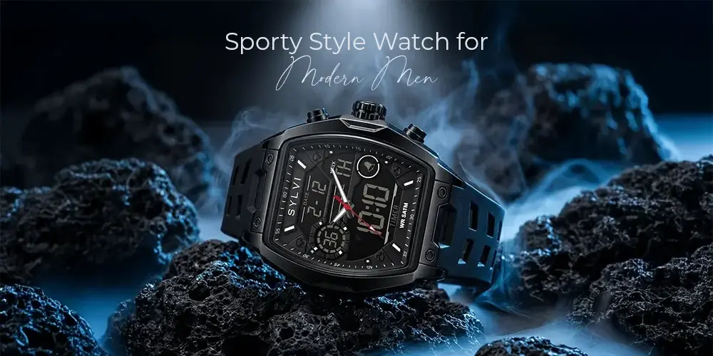 Close-up of the Sylvi Vanguard All Black silicone strap watch resting on tactical rocks, highlighting the digital display and rugged case.