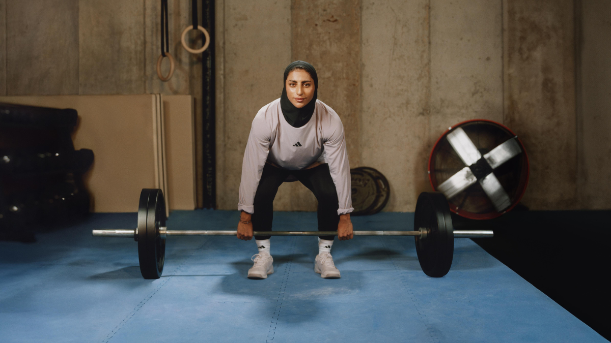 adidas Unveils Leopard-Print Optimé Leggings: The New High-Performance ‘Squat-Proof’ Icon for India’s Strength Community 5 Emirati National Champion Shahad Budebs wearing an adidas performance hijab and leopard-print Optimé leggings while performing a barbell deadlift in a gym.