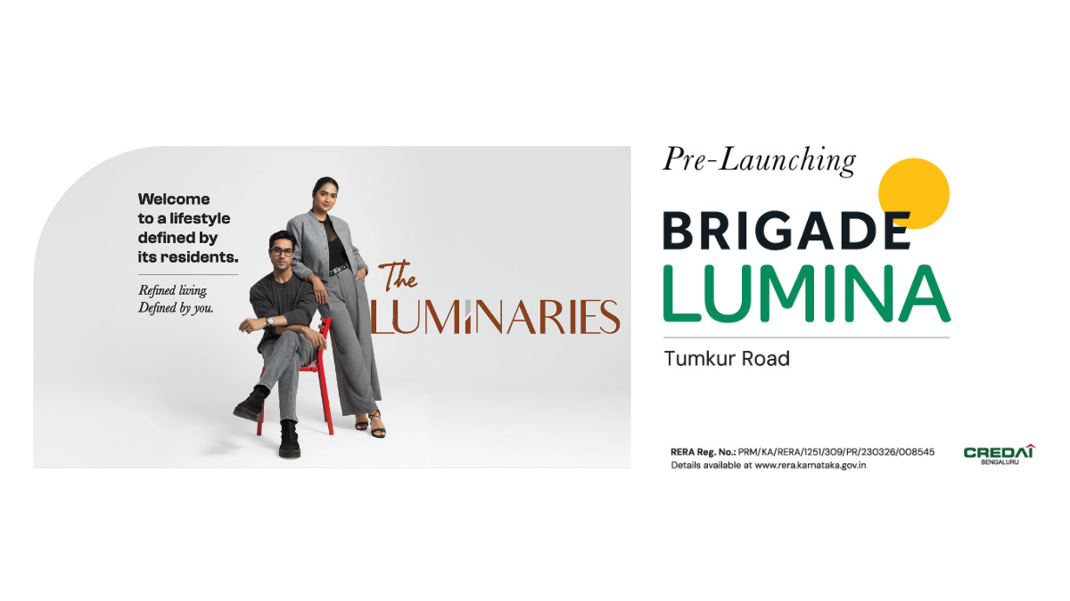 Marketing banner for Brigade Lumina on Tumkur Road, Bengaluru, featuring two models under the campaign "The Luminaries" and the slogan "Welcome to a lifestyle defined by its residents".