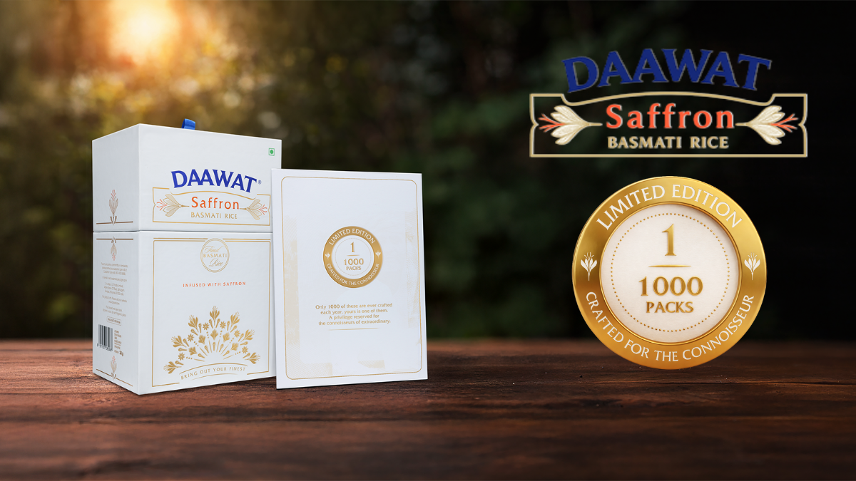 India’s First Saffron-Infused Basmati: LT Foods Unveils the Exclusive DAAWAT Collector’s Edition 1 Luxury white and gold packaging of Daawat Saffron Basmati Rice displayed on blue silk fabric with a prominent gold limited edition badge.