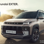 Front three-quarter view of the new 2026 Hyundai Exter facelift in a Khaki-sand finish showing the starting price of ₹5,79,900.