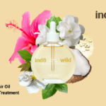 indē wild Champi Hair Oil bottle featuring a blend of hibiscus, jasmine, and coconut for traditional Indian head massage.