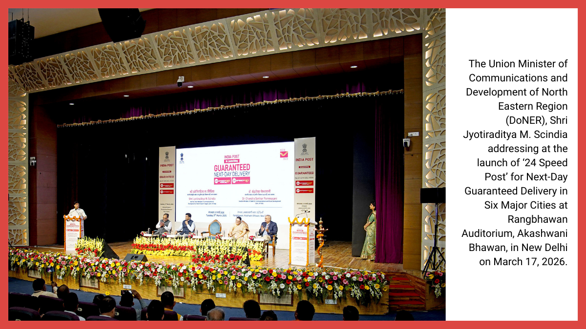 A wide-angle shot of the stage at Akashwani Bhawan showing dignitaries, including Minister Scindia and Dr. Chandra Sekhar Pemmasani, seated during the 24 Speed Post inauguration ceremony.