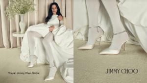 Gabbriette wearing ivory satin Jimmy Choo SAEDA pumps with crystal-embellished anklets for the 2026 Bridal Collection.