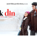Junaid Khan and Sai Pallavi standing in a snowy landscape in Japan for the official poster of the movie Ek Din by Aamir Khan Productions.