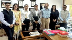 Officials from KRAFTON India and DPIIT posing together with signed Memorandum of Understanding documents at a formal cerem...