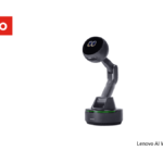 A Lenovo ThinkBook Modular AI PC Concept laptop connected via cable to a detachable 14-inch secondary display positioned in vertical portrait mode.