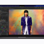 Front-facing view of the new MacBook Pro in Space Black running professional photo editing software Capture One on a Liquid Retina XDR display.