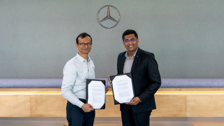 Prof. Preeti Ranjan Panda of IIT Delhi and Manu Saale of Mercedes-Benz Research and Development India holding the formal 5-year Master Research Agreement for joint innovation in future mobility.