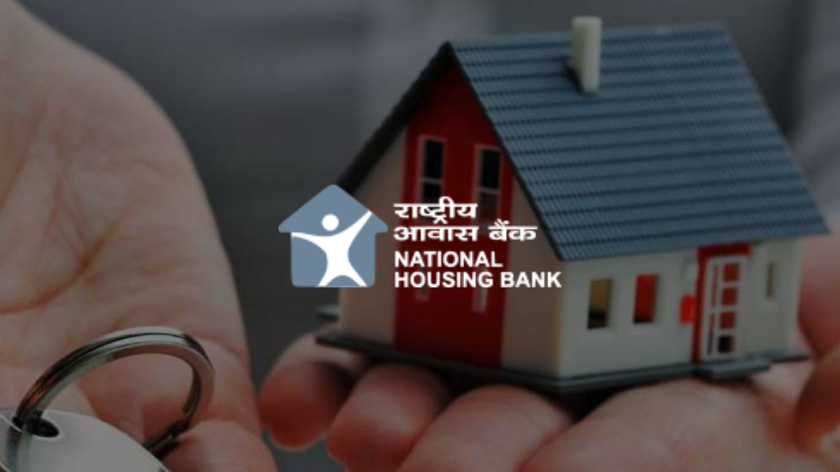 Home Loans at Your Fingertips: NHB Launches ‘Gruh Sugam’ Portal for Defence & Govt Personnel 1 National Housing Bank (NHB) logo displayed over hands holding a small house model and keys, representing the digital Gruh Sugam portal for streamlined home loans for government and defense employees.