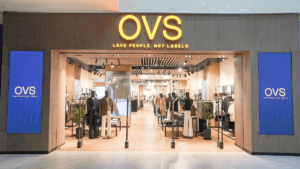 Exterior view of the OVS flagship store at Sky City Mall Borivali Mumbai, featuring a modern wood-paneled storefront with ...