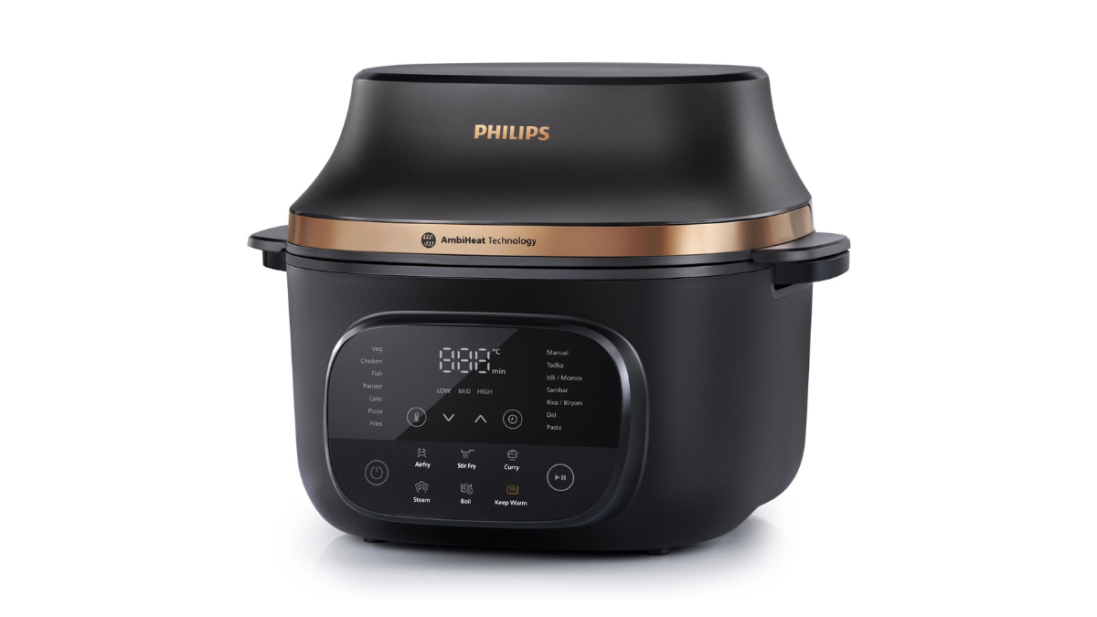 Philips OneChef NX5300/00 Launched in India: The 33-in-1 Smart Powerhouse Redefining Modern Desi Cooking 1 Front view of the black Philips OneChef NX5300/00 smart cooking device featuring a digital touch interface with Indian presets like Tadka and Sambar.