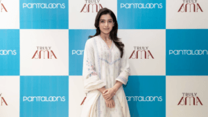 Actor Samantha Ruth Prabhu posing against a branded backdrop of Pantaloons and Truly SMA during the official launch event ...