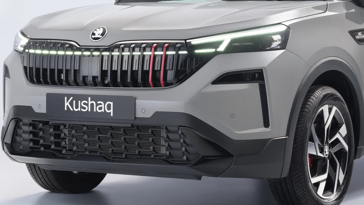Close-up of the 2026 Skoda Kushaq Monte Carlo front fascia featuring a gloss black grille with red vertical accents and a segment-first segmented LED light bar.