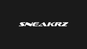 Official white SNEAKRZ brand logo on a solid black background, representing India's premier youth-focused sneaker and stre...