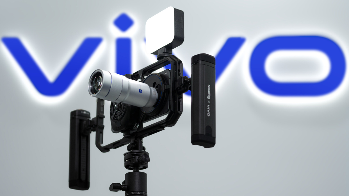 Close-up of the vivo X300 Ultra mounted in a SmallRig professional camera cage with the 400mm Zeiss Telephoto Extender Gen 2 Ultra and top-mounted LED light.