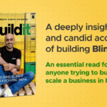 Official book cover of Buildit by Albinder Singh Dhindsa, founder of Blinkit, featuring him sitting in front of yellow and...