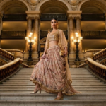 AI-generated photorealistic image of a model wearing a WforWoman gold sequin crop top and floral skirt on a grand marble s...
