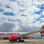 Side profile of Air India’s first retrofitted Boeing 787-8 Dreamliner (VT-ANT) featuring the bold new red and gold livery,...