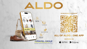 Smartphone showing the ALDO India app interface next to shoes and a handbag, highlighting 24-hour delivery on marble backd...