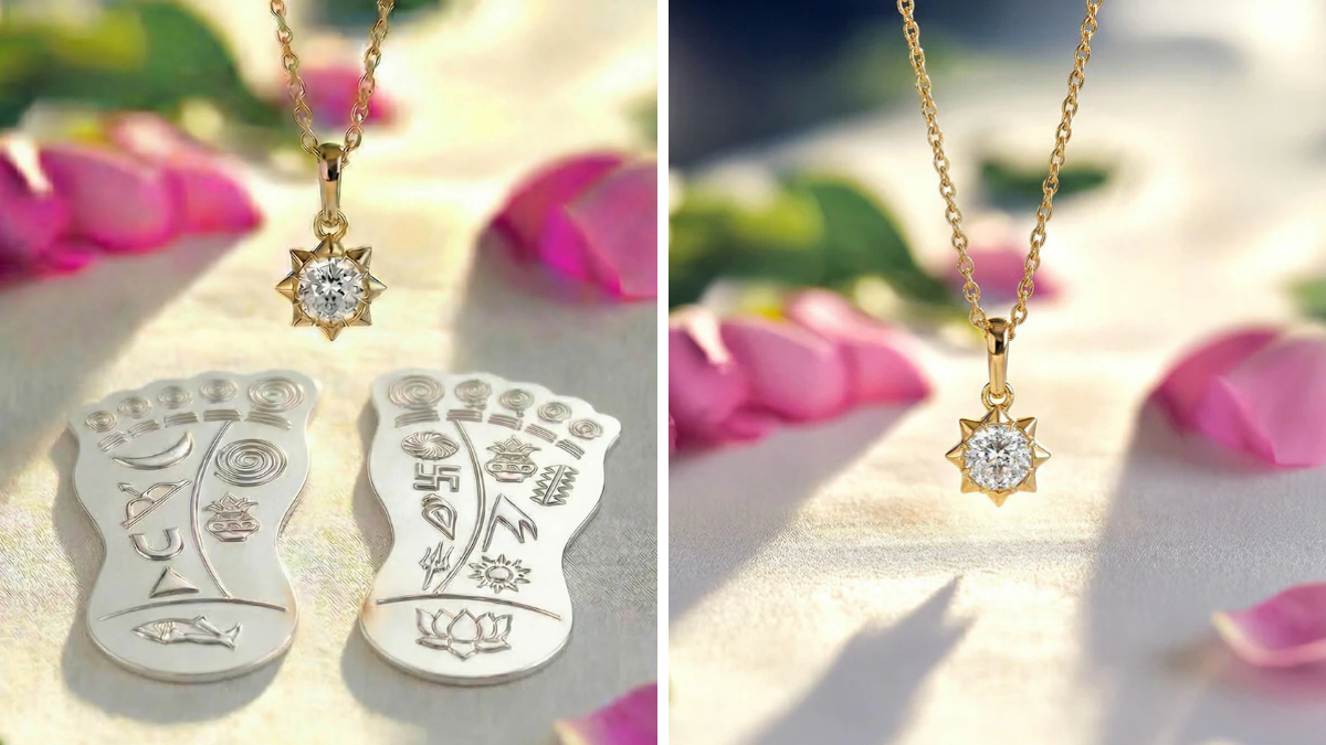 The Aukera Ashtalakshmi Solitaire pendant hanging above silver Lakshmi Paduka footsteps among pink flower petals.