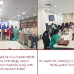 C-DOT CEO and Jumps Automation officials signing documents and in a meeting about cybersecurity gamification in India.