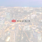 Aerial skyline view of Mumbai city at dusk with the red and black Equinix company logo centered, representing the launch of the MB3 data center.