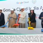 Dignitaries in hard hats holding shovels at the Google Cloud India AI Hub groundbreaking ceremony in Visakhapatnam.
