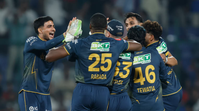 Gujarat Titans players including Shubman Gill, Kagiso Rabada, and Rahul Tewatia celebrate a dramatic 1-run victory over Delhi Capitals in TATA IPL 2026 Match 14.