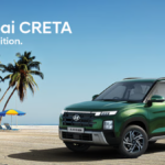 Front three-quarter view of the new Hyundai CRETA Summer Edition in Robust Emerald Pearl parked on a sunny tropical beach with palm trees.
