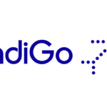 Blue IndiGo brand logo with a dotted airplane icon on a white background representing new Jamnagar flight services in India.