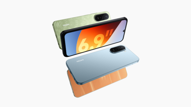 Three REDMI A7 Pro smartphones in Palm Green, Sunset Orange, and Mist Blue showing the massive 6.9-inch immersive display.