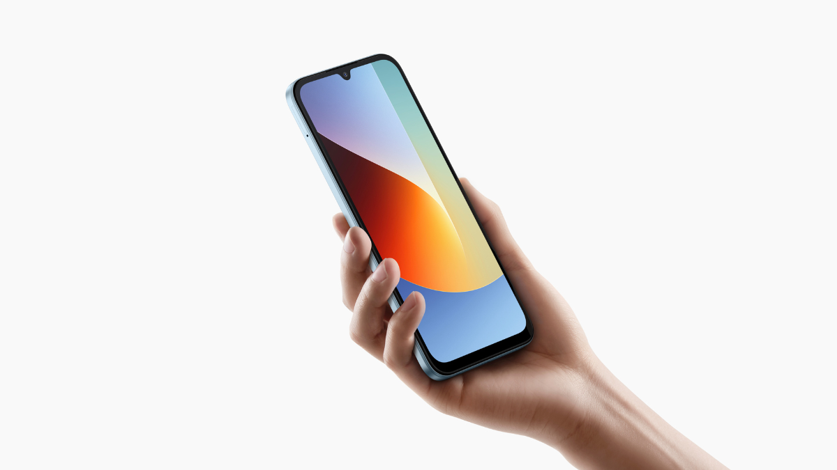 REDMI A7 Pro Launch: The First Budget ‘Pro’ with HyperOS 3 and a 6000mAh Battery 3 A hand holding the Mist Blue REDMI A7 Pro, showcasing the teardrop notch display and slim 8.15mm body.