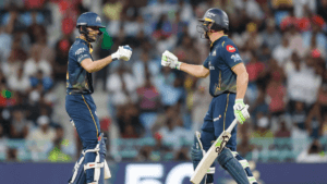Gujarat Titans' Shubman Gill and Jos Buttler fist-bumping during their match-winning 85-run partnership against Lucknow Su...