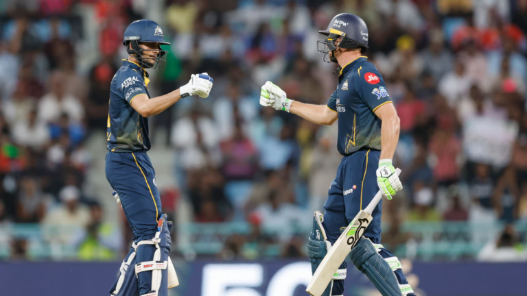 Gujarat Titans' Shubman Gill and Jos Buttler fist-bumping during their match-winning 85-run partnership against Lucknow Su...