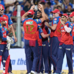 Punjab Kings players including Shreyas Iyer, Arshdeep Singh, and Marcus Stoinis celebrating their seven-wicket victory aga...