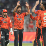 Sunrisers Hyderabad players Nitish Kumar Reddy and Jaydev Unadkat celebrating a crucial wicket during the KKR vs SRH Match 6 of TATA IPL 2026 at Eden Gardens.