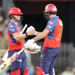 Punjab Kings debutant Cooper Connolly and Xavier Bartlett celebrate their thrilling three-wicket win over Gujarat Titans i...